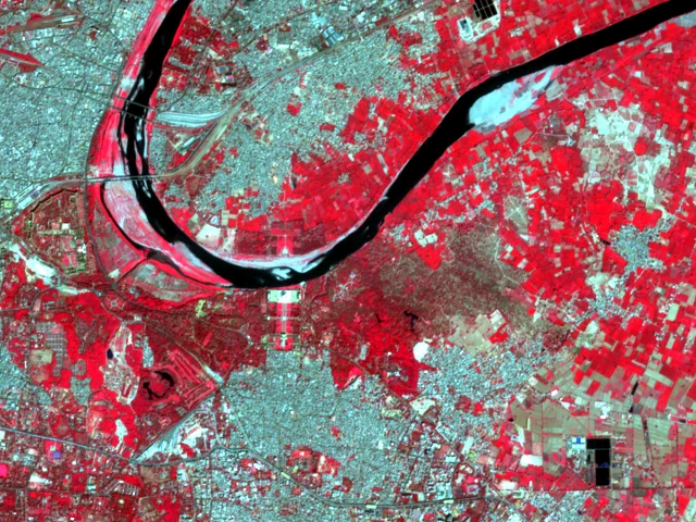 Satellite image of Agra in false colour: near-infrared is shown as red, so the fields across the river glow bright red